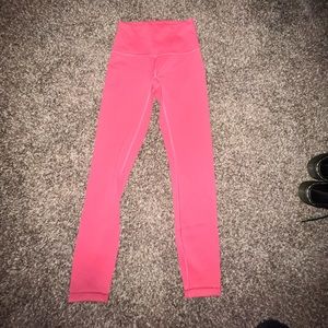 Rosy red lululemon leggings. Size 2 or 4 I believe but no tag so not positive
